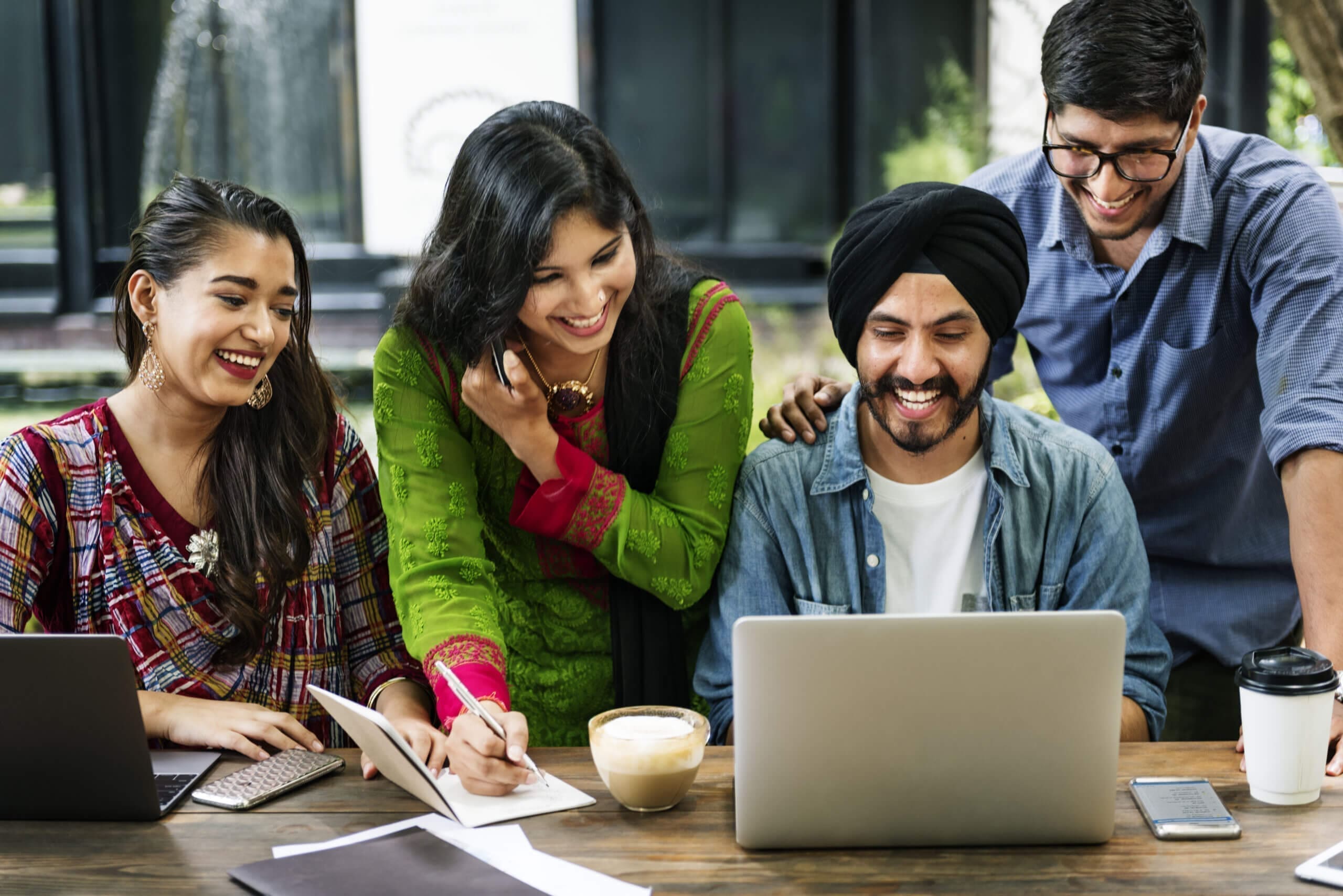 Friends Technology Devices Smiling Indoors Concept