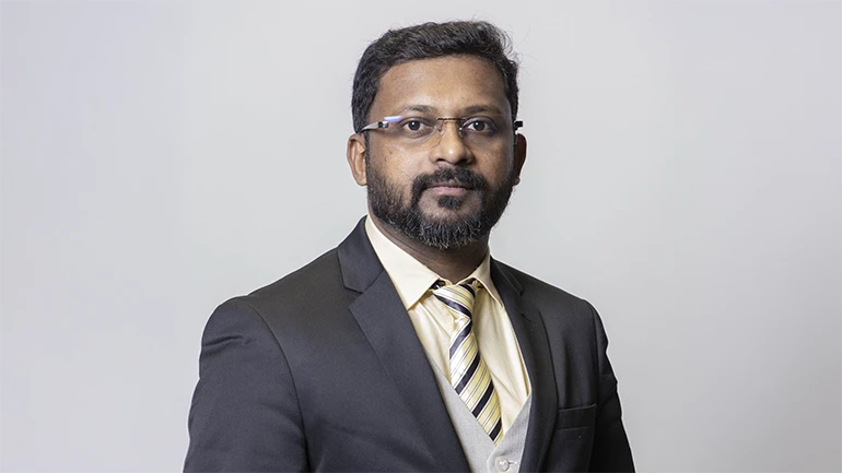 Dr Manesh Thankappan